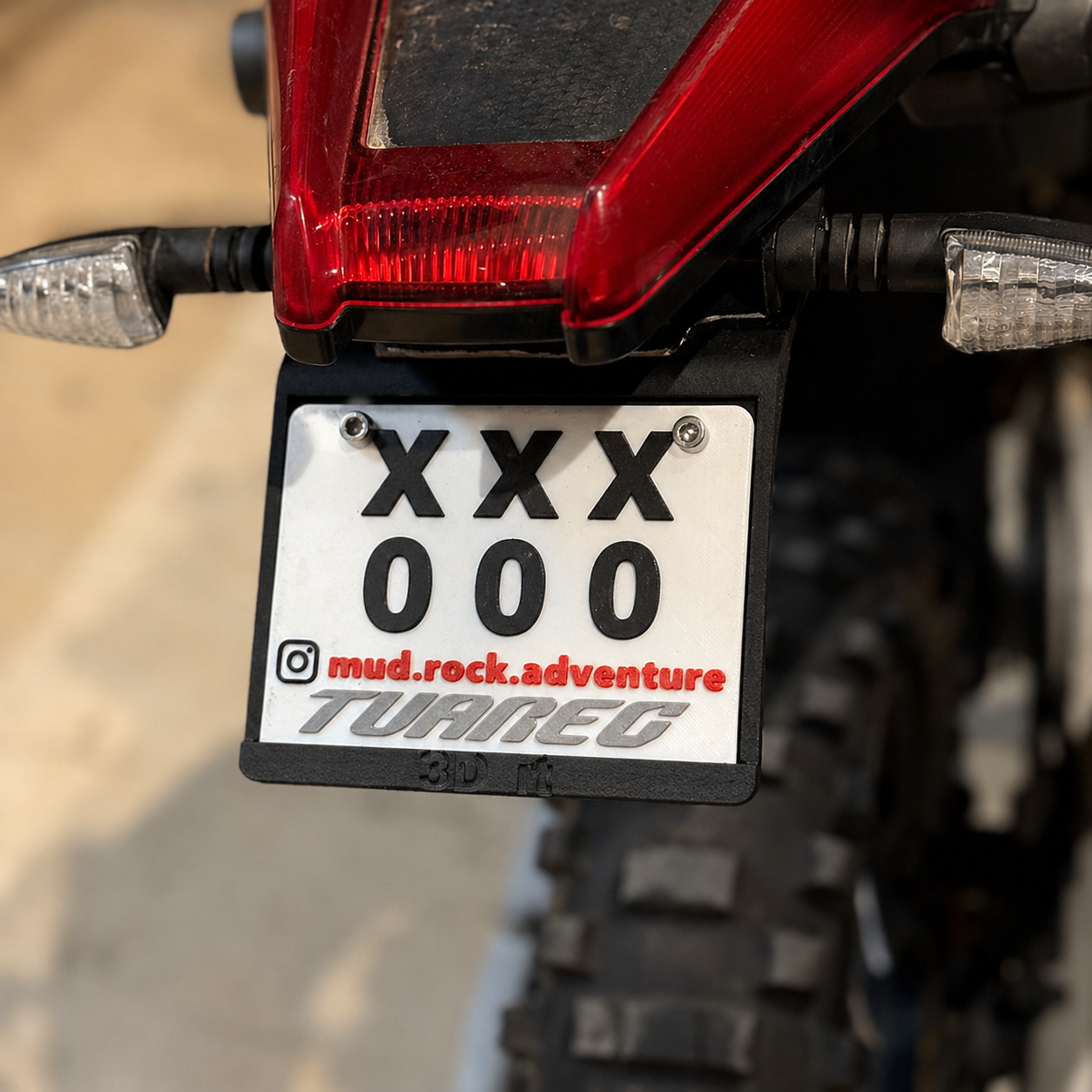 3d-printed-custom-off-road-plate (4) Custom 3D printed off-road motorcycle plate with XXX 000 design mounted on rear fender, close-up detail